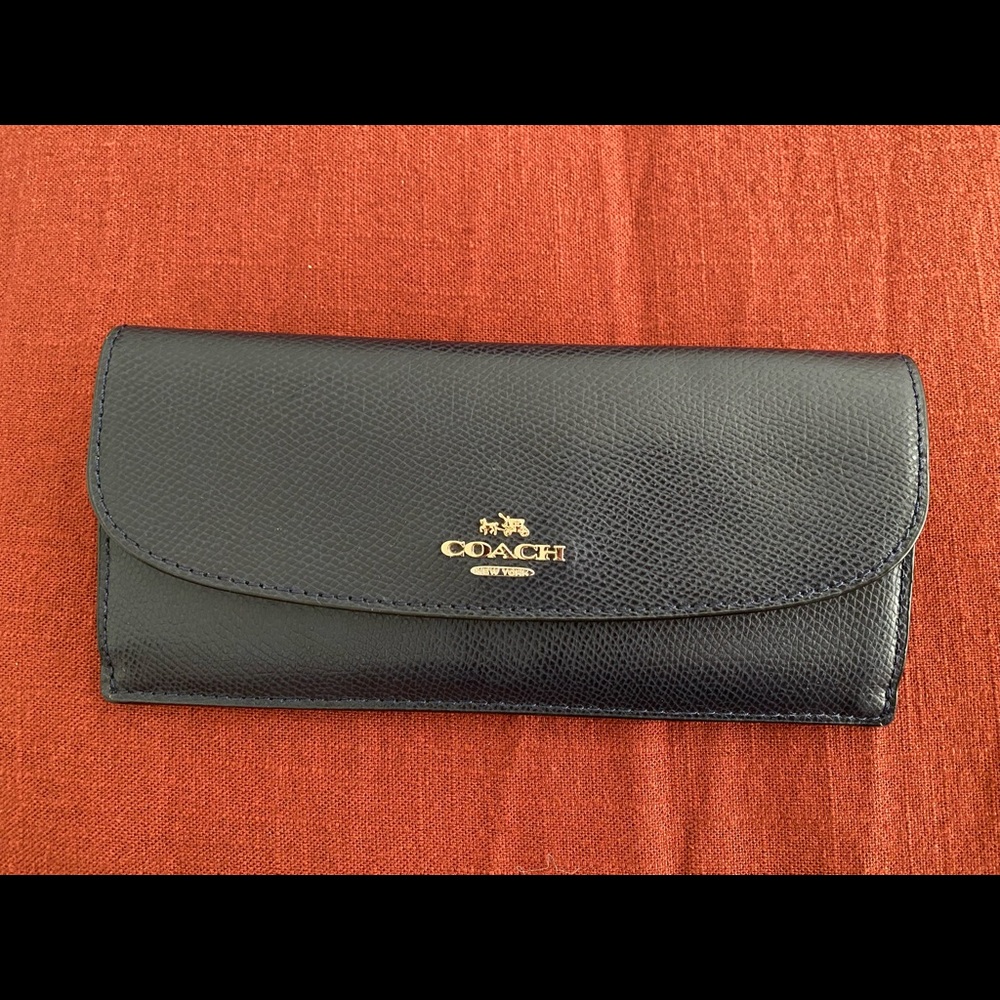 It’s NAVY BLUE but looks black. Brand new.
